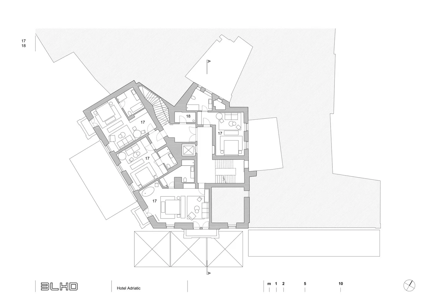 A detailed architectural plan of a hotel, showcasing the layout of various floors and rooms.
