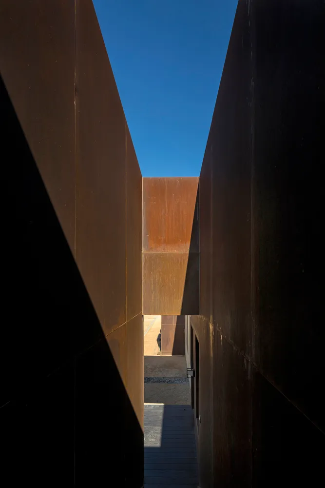 Minimalist architectural design showcasing metallic walls