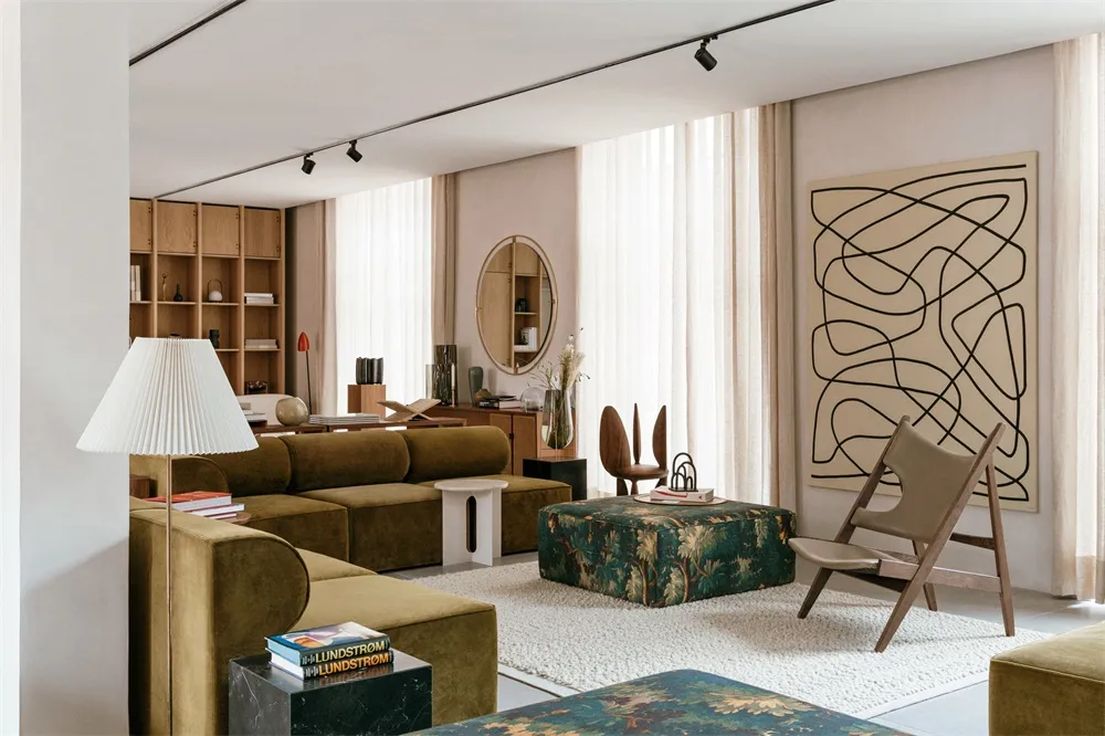 A minimalist residential interior with velvet upholstery, wooden accents, and glass elements.