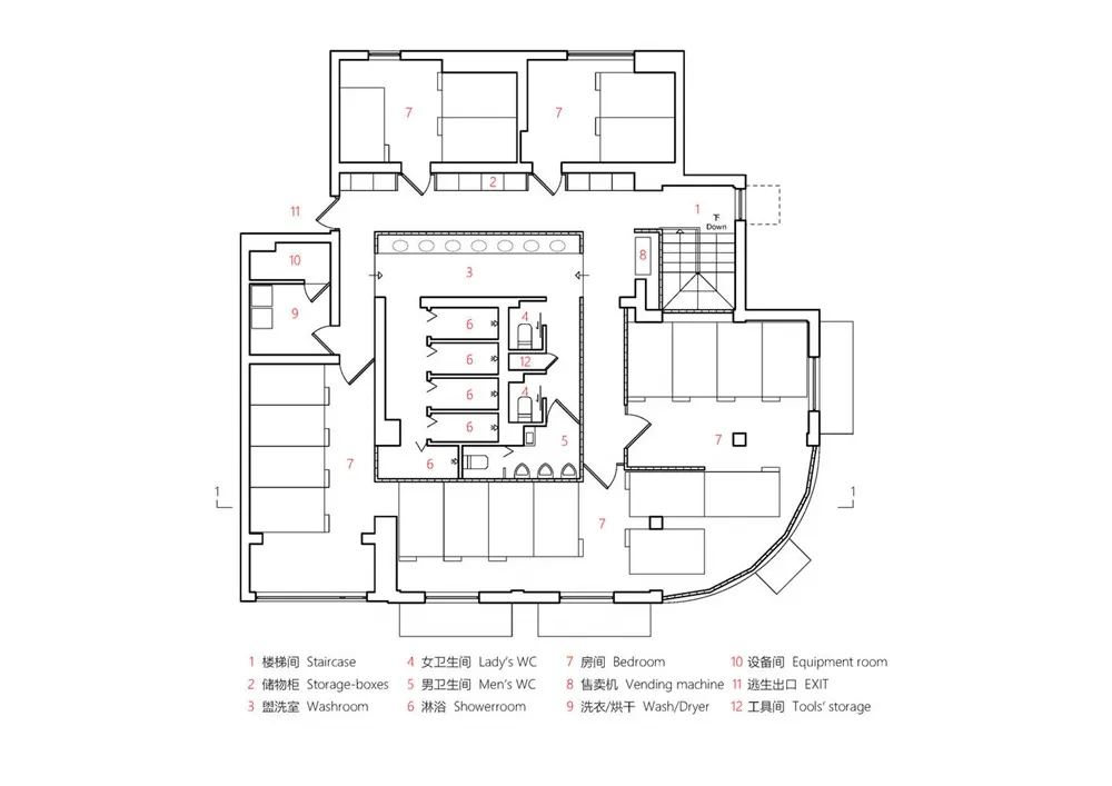 Floor plan of a residential building showing rooms, bathrooms, and common areas.