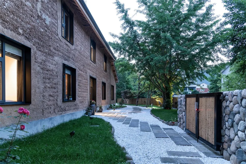 A modern residential exterior made of concrete.