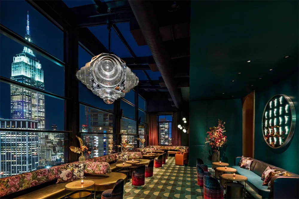 Modern rooftop bar featuring cityscape views.
