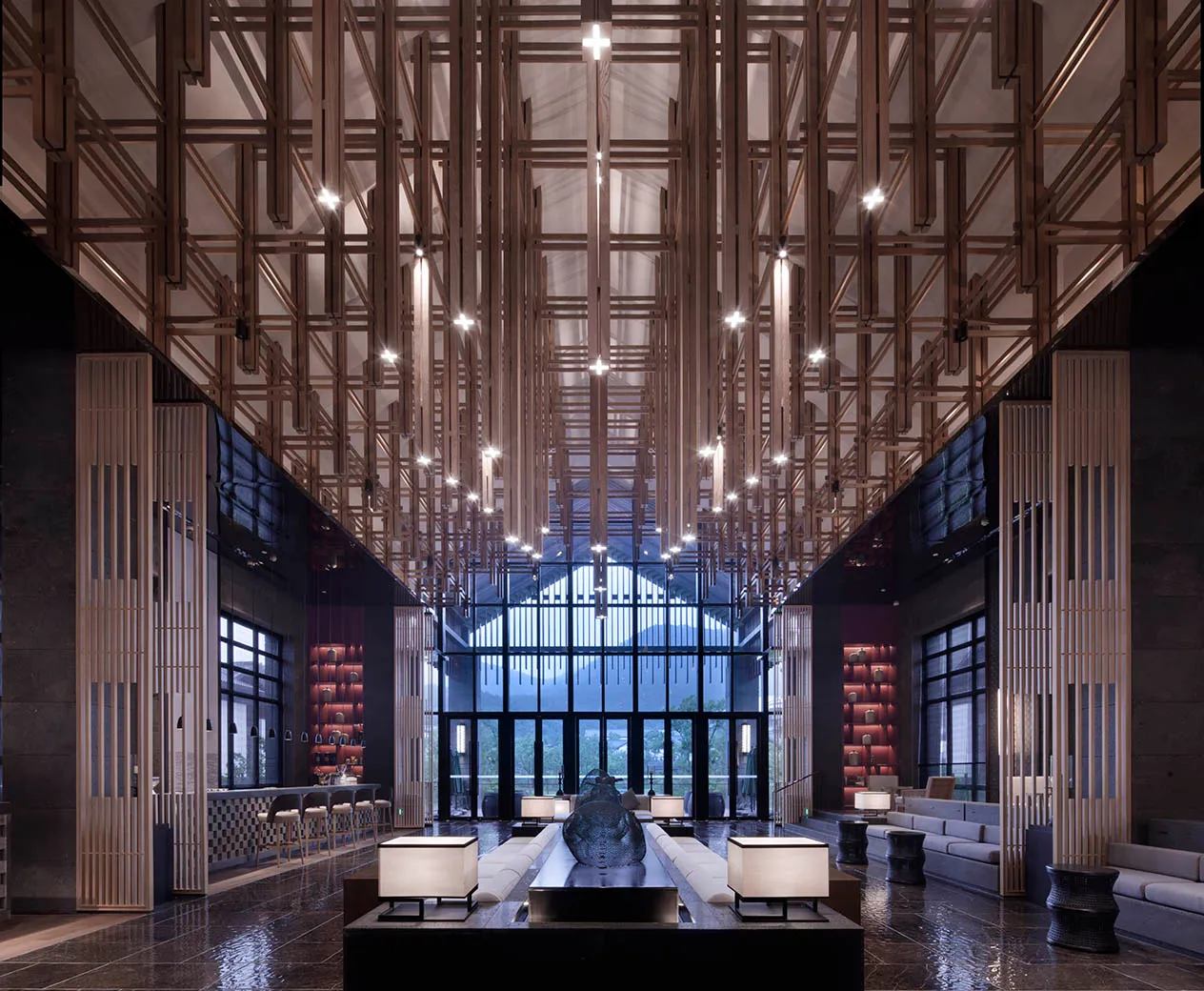 Modern hotel lobby featuring concrete and wood materials with high ceilings and large windows.
