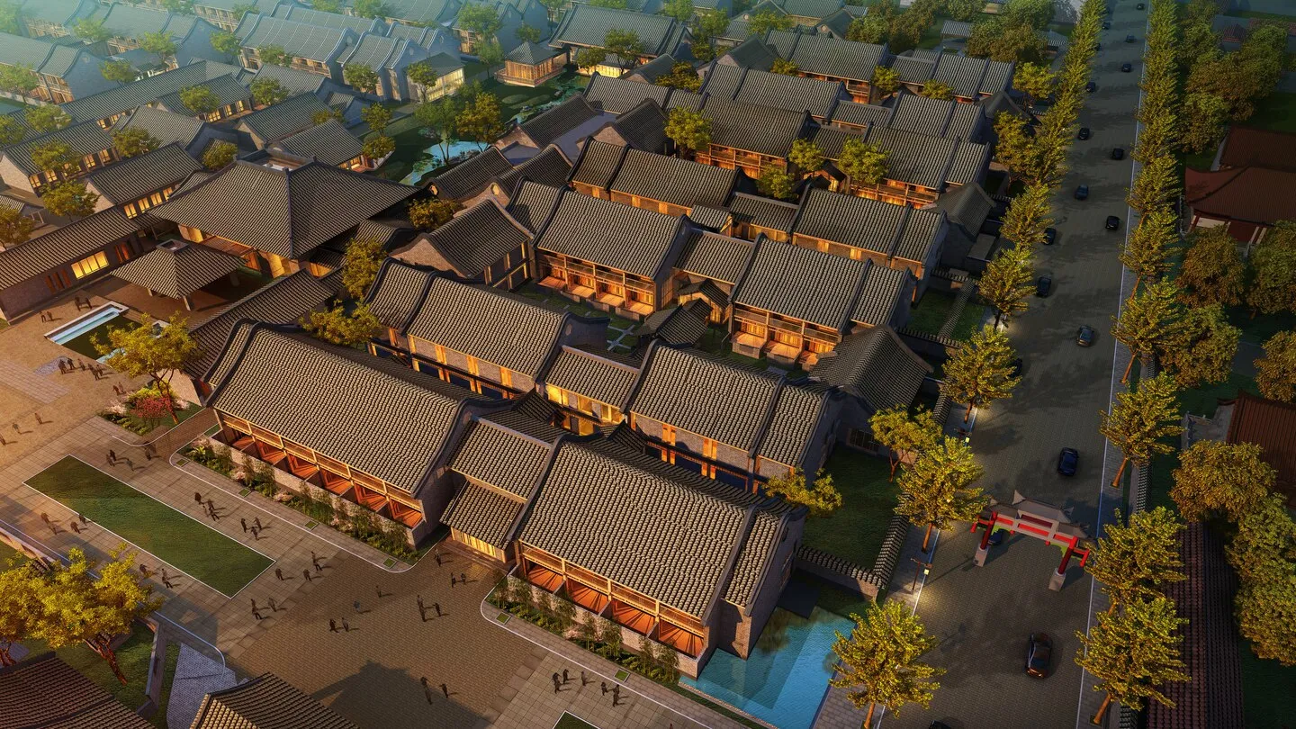 Aerial view of traditional brick townhouses with green roofs and windows.
