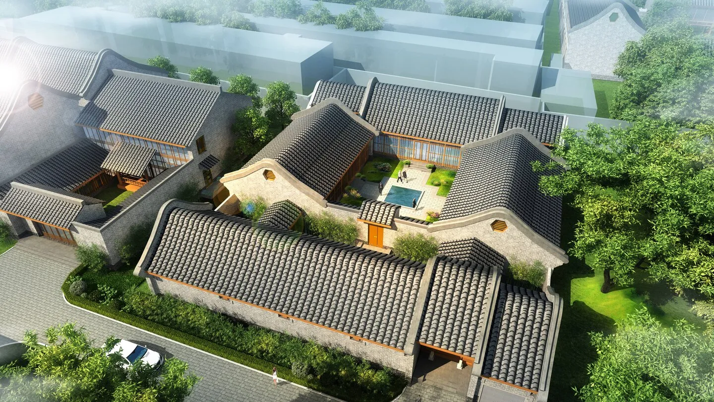 A traditional courtyard residence featuring brick walls and a tiled roof.