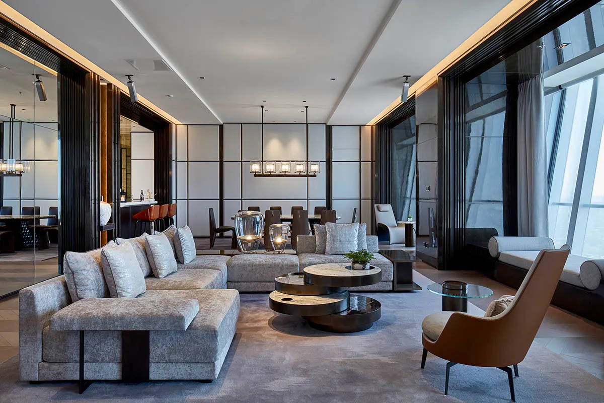 Modern/Contemporary living room featuring concrete, glass, and metal materials.