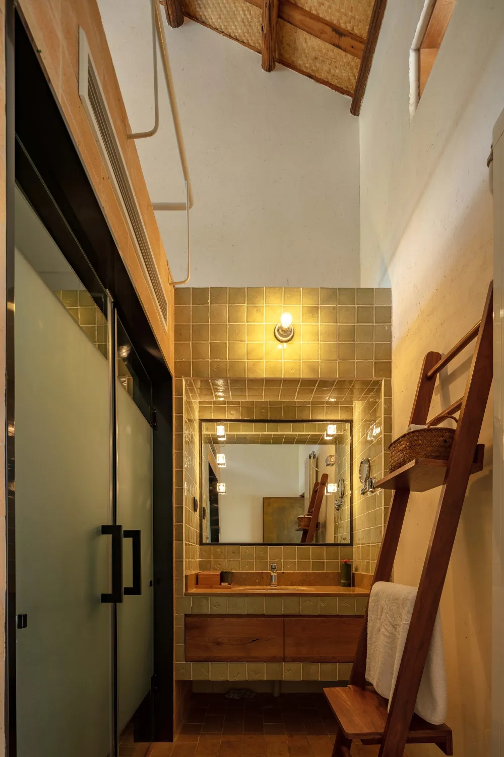 Modern bathroom with ceramic tiles and wooden accents