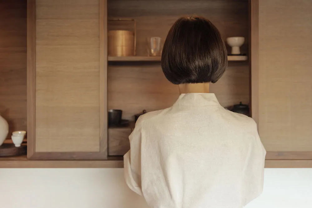 A modern coffee shop with minimalist wood interior design