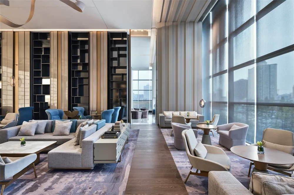 Modern luxury conference room with concrete, matte black, and white furniture.