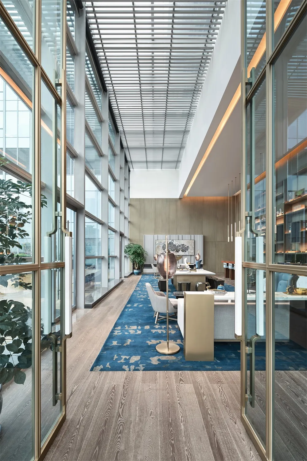 Modern office space interior featuring wooden tiles on the floor and walls, with a clean and contemporary design.