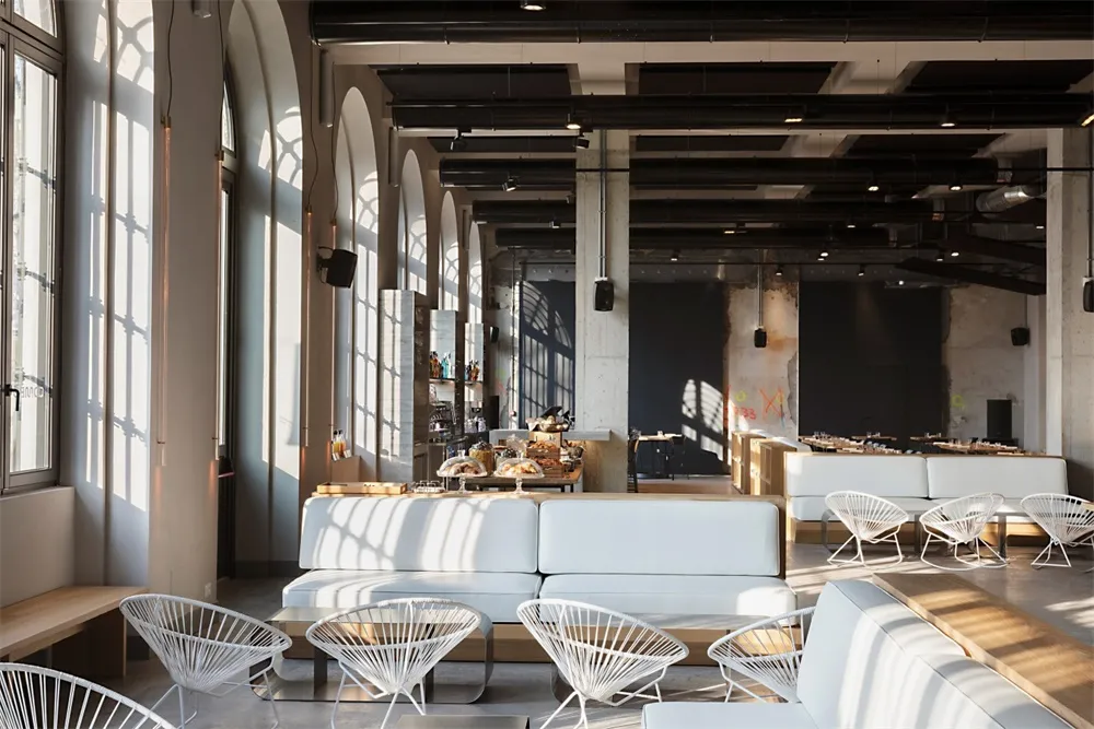 Modern industrial restaurant interior with concrete design elements.