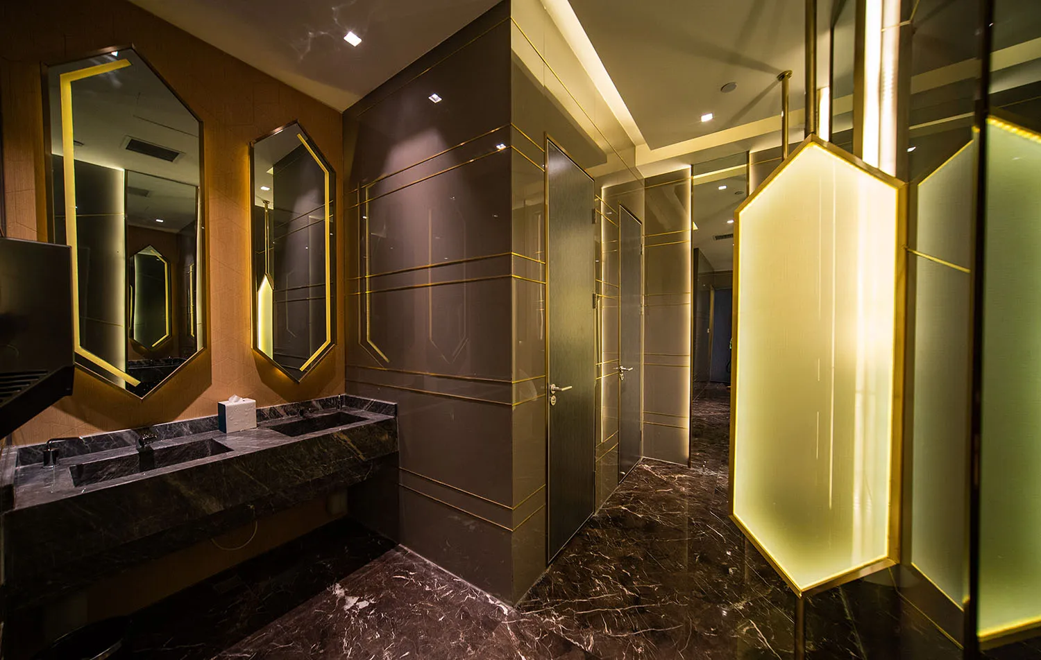 A modern bathroom featuring marble elements and a sleek, contemporary design.