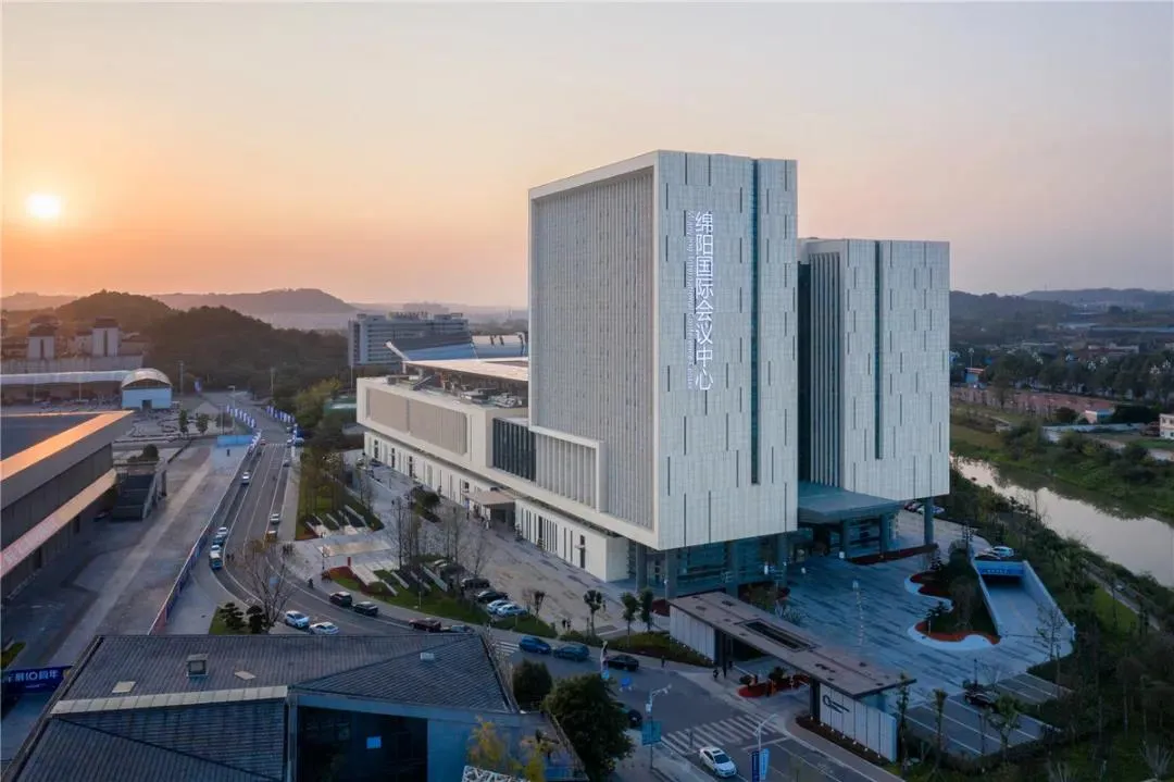 Modern office building exterior with metal cladding and sleek design.
