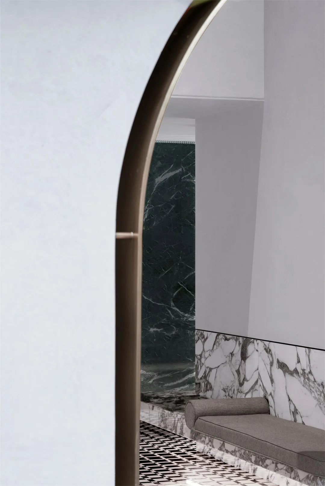 Modern interior design of a retail storefront featuring contemporary concrete and marble elements.