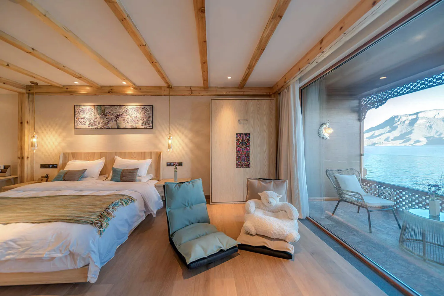A modern bedroom featuring wooden furniture, glass windows, and metal accents.