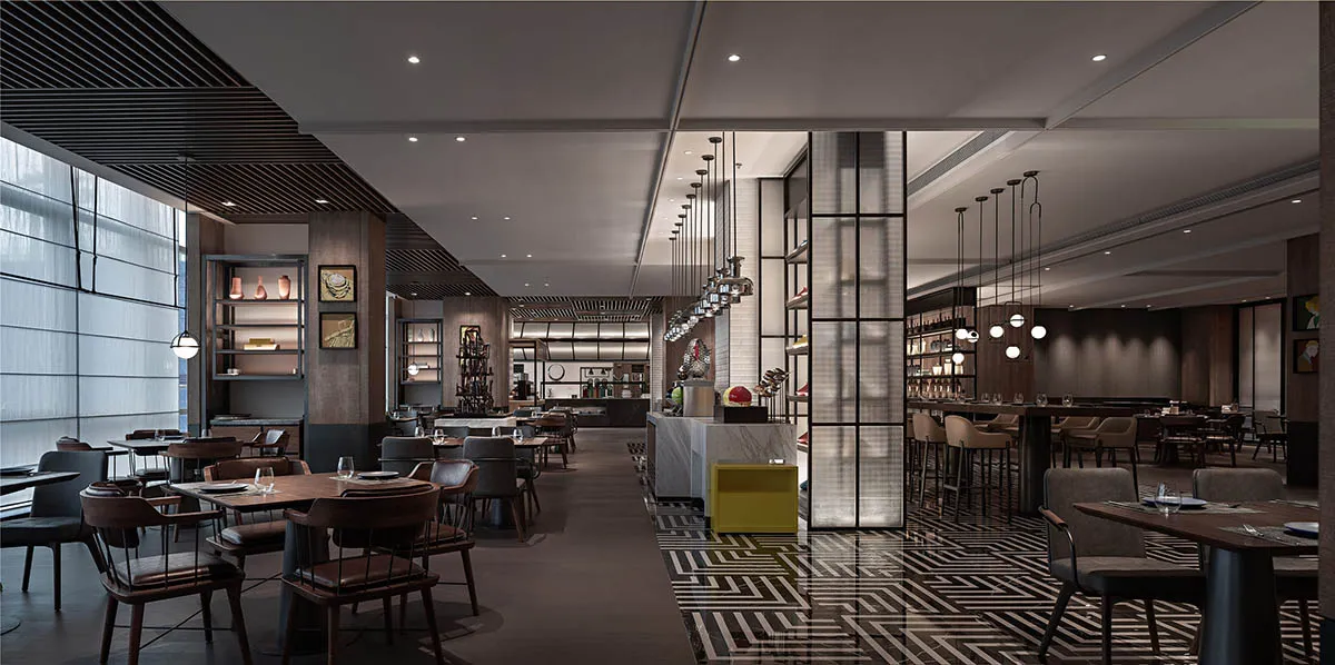 Modern restaurant interior with concrete and glass materials.
