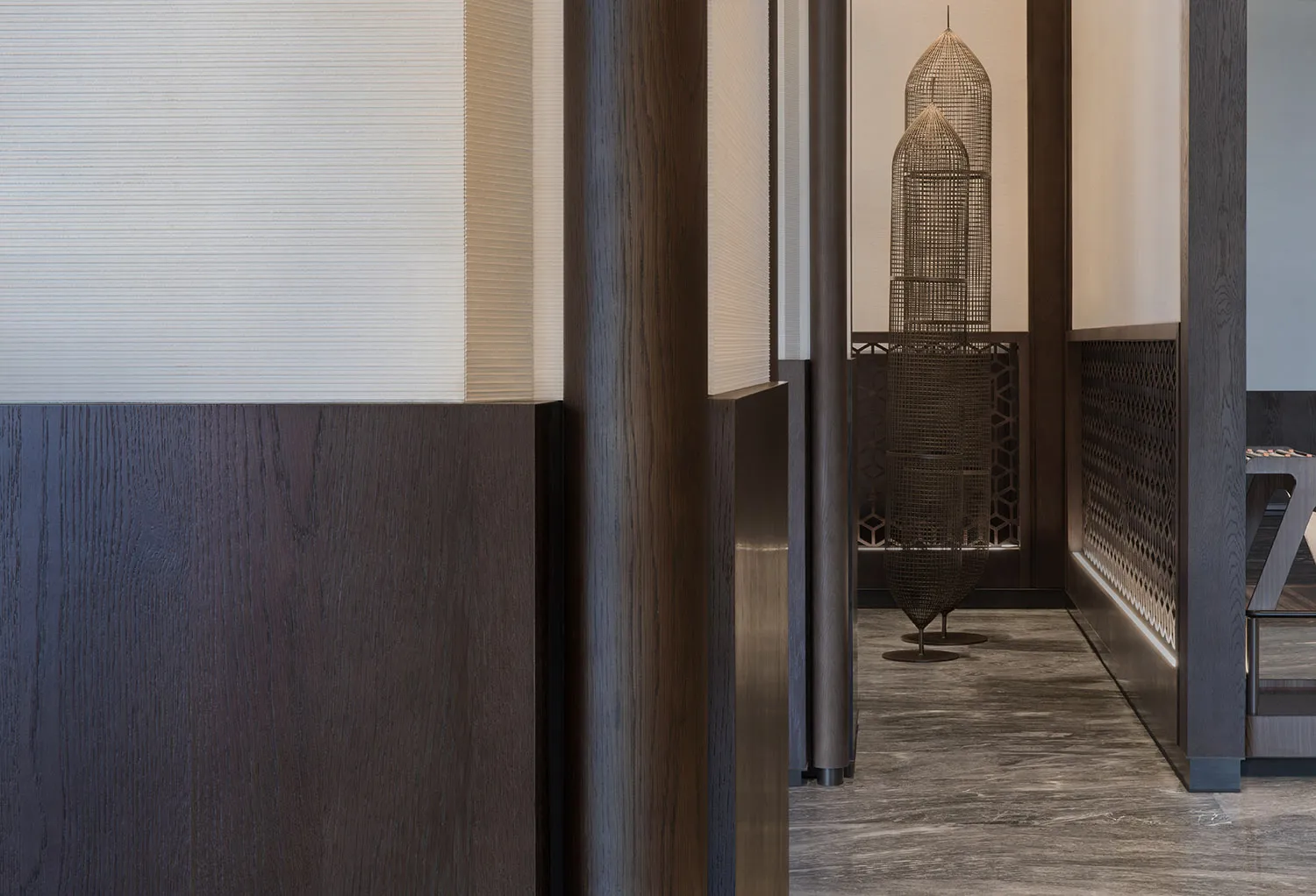 Luxurious corridor lighting with wooden walls and metallic wire elements, showcasing a modern design aesthetic.