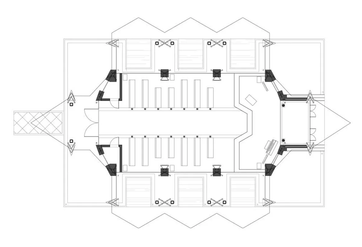 Floor plan of a church interior, showing pews, an altar, and other religious symbols.