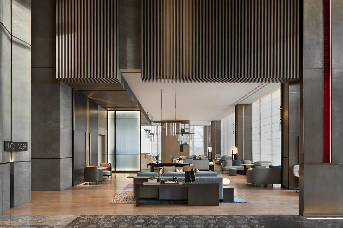Industrial-style lobby with concrete walls and floors