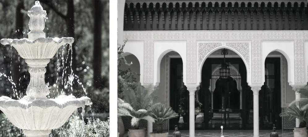 Modern entrance with arches featuring intricate stone detailing.