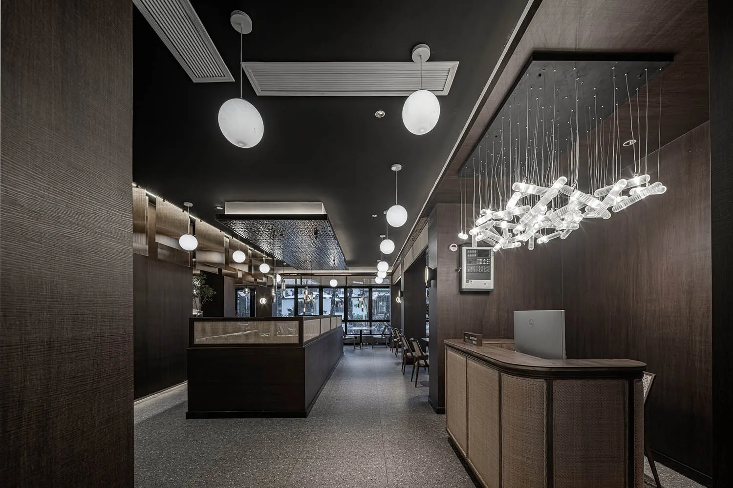 A modern office with wooden finishes, featuring clean lines and contemporary design elements.