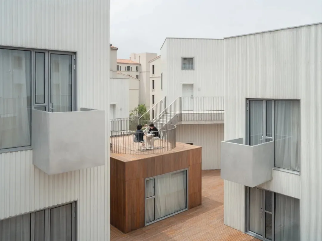 Modern architectural building exterior with concrete materials and contemporary design.