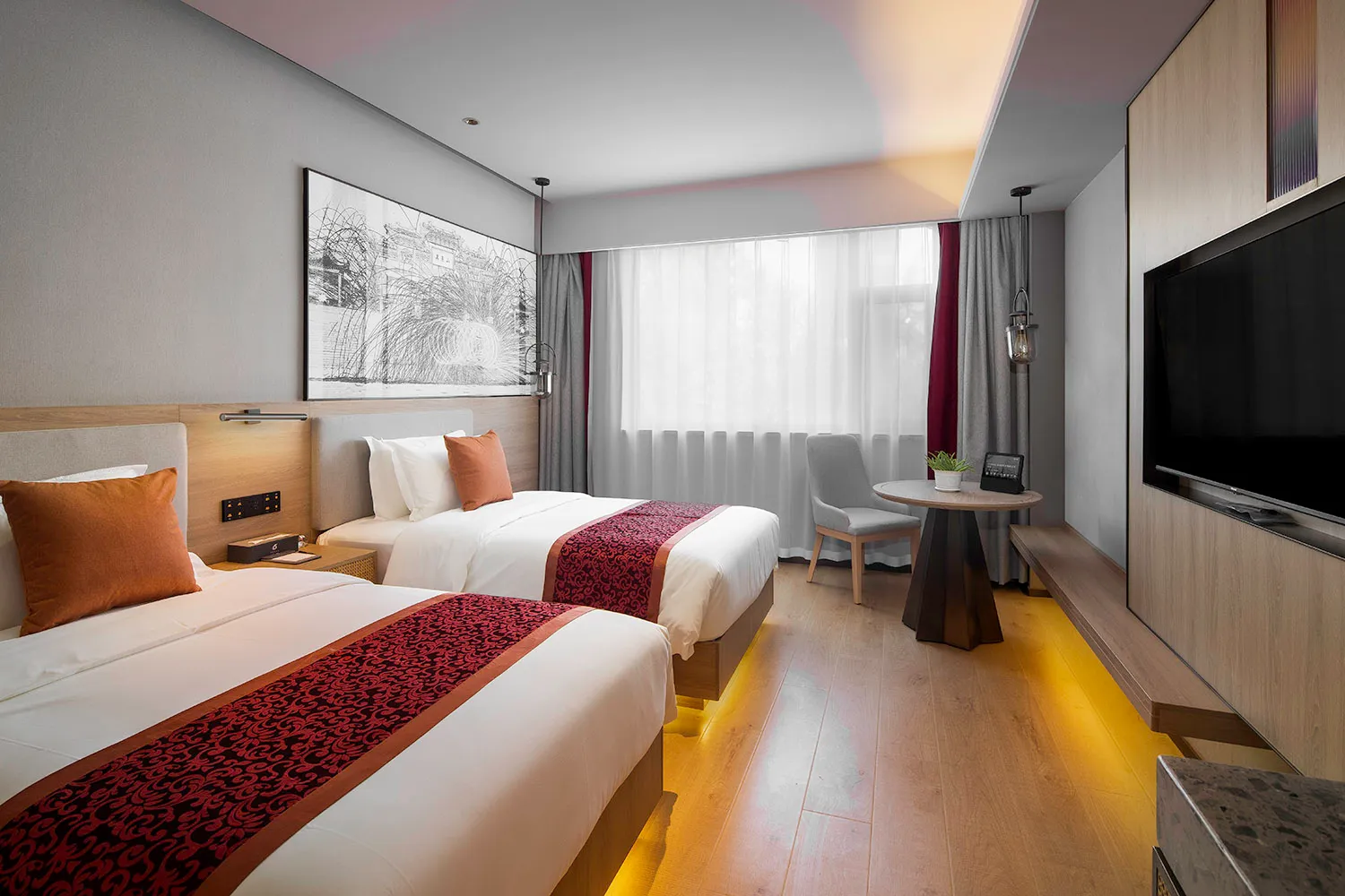 Modern bedroom with wooden furniture, fabric bedding, and glass window.
