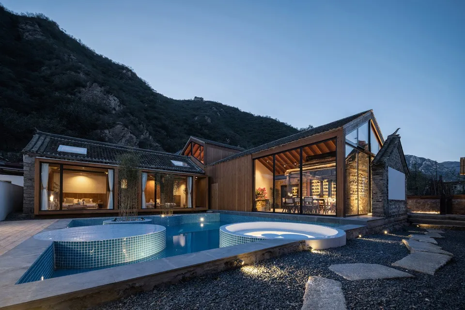 Modern residential house with a pool and wooden exterior