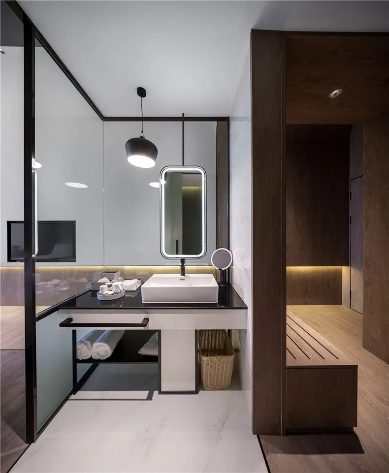 Modern bathroom with marble floor and wooden accents