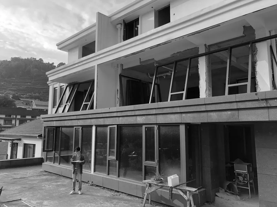 Concrete and glass building under construction