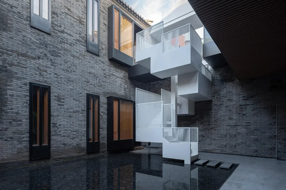 A modern building exterior constructed of brick.