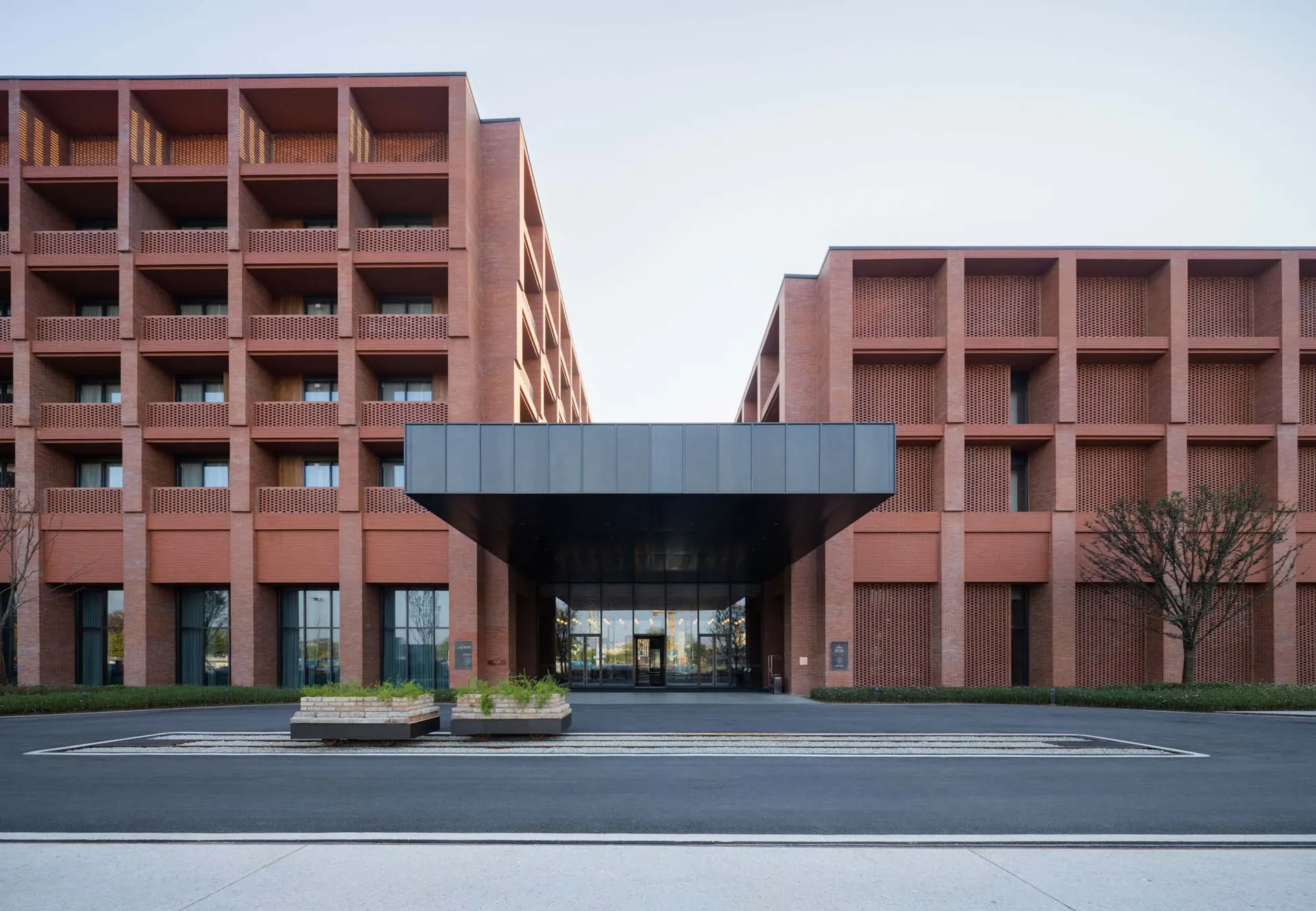 Modern residential building with brick and concrete exterior and interior
