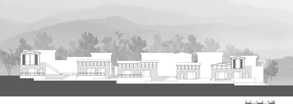 一座兩層樓的現代住宅增建,擁有混凝土牆面與平屋頂。