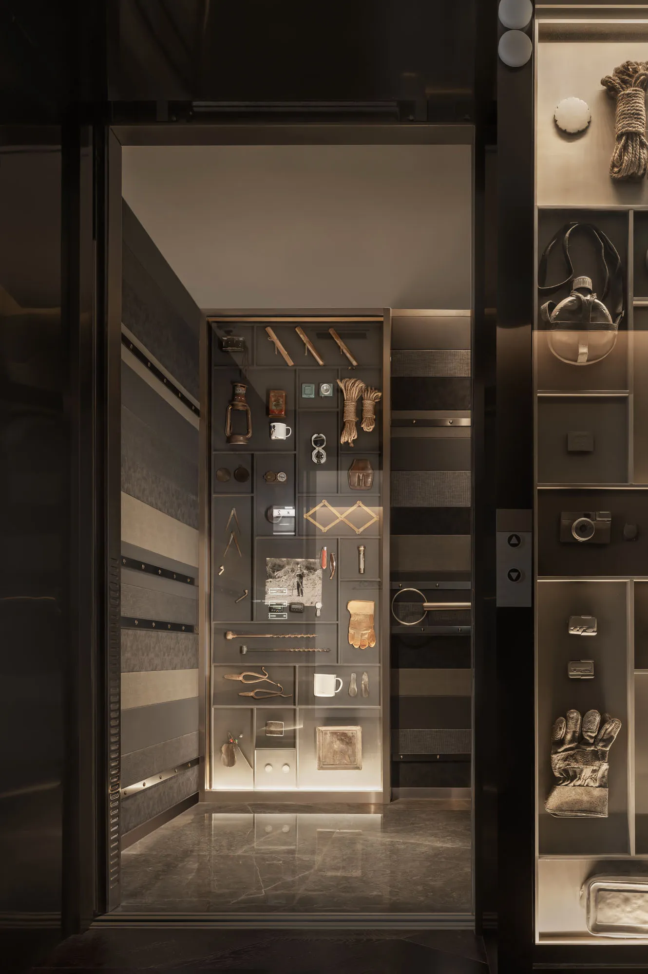 A storefront with an industrial design featuring metal and glass elements.