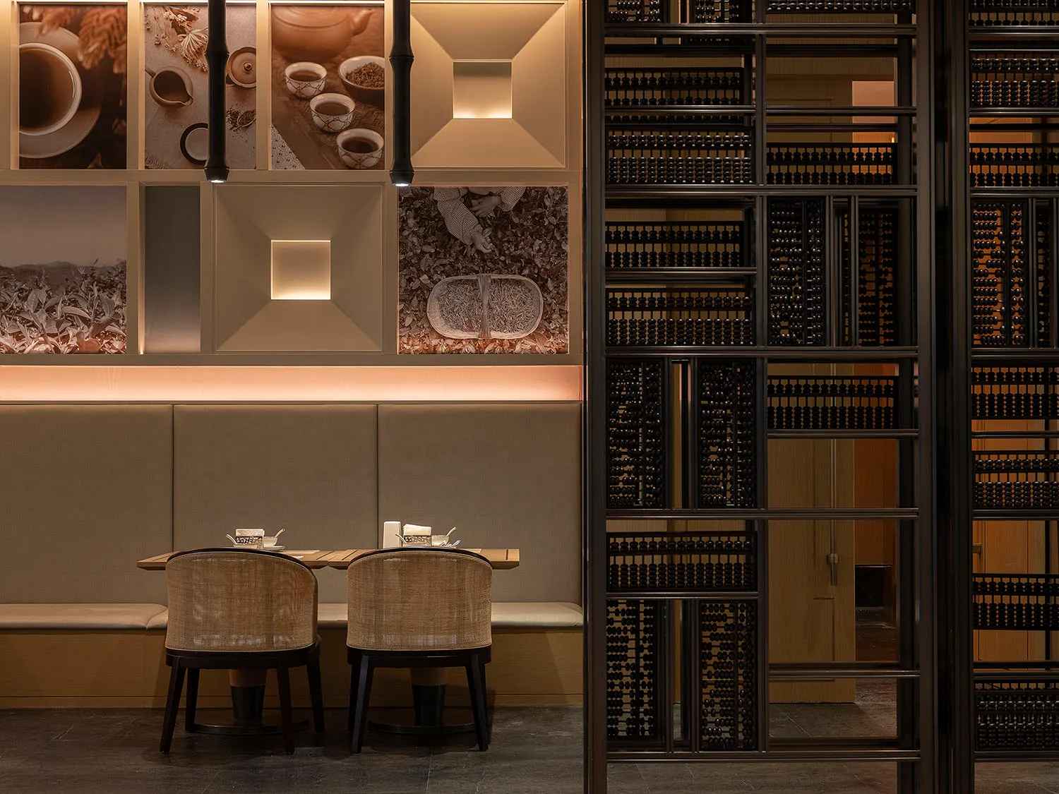 A minimalist restaurant interior with wooden, metal, and glass elements