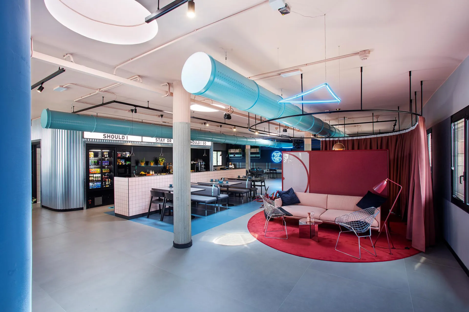 Modern office interior with metal, glass, and concrete materials.