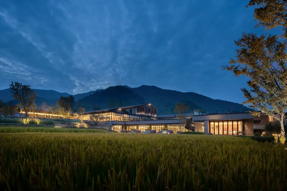 Modern restaurant exterior with glass and stone materials