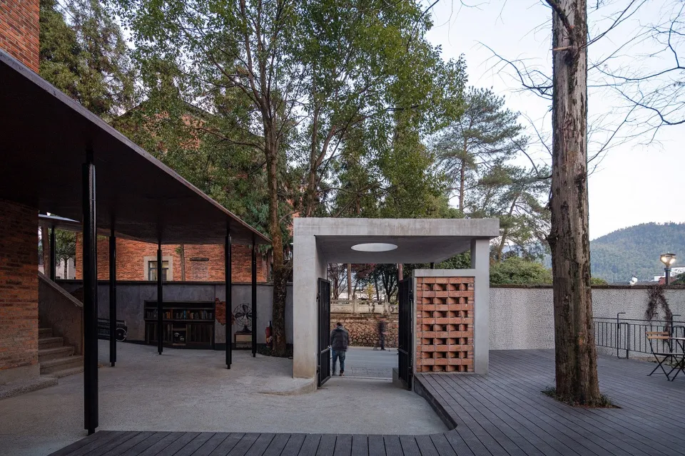 Concrete minimalist architectural space featuring natural surroundings and simple design