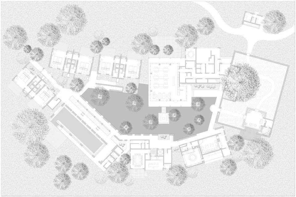 A detailed architectural drawing of a residential building's floor plan, showcasing modern design elements and layout.