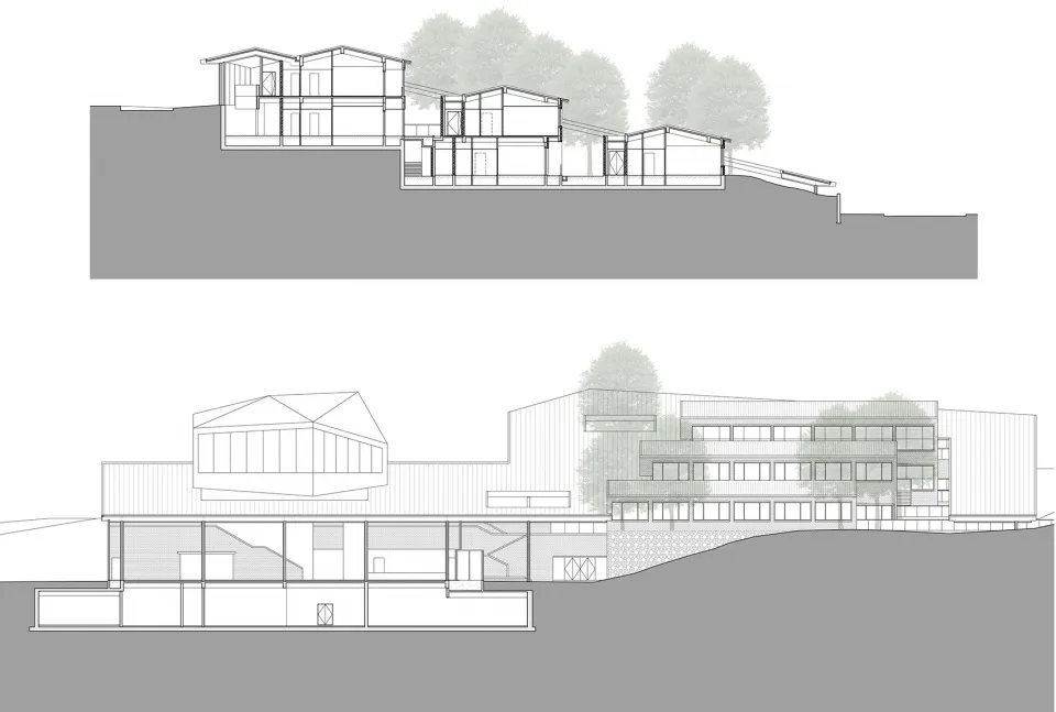A modern house with a glass balcony overlooking a hillside.