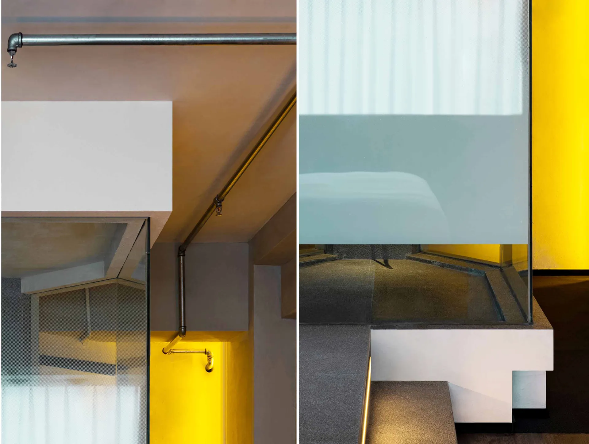Modern industrial interior design featuring concrete and glass elements.