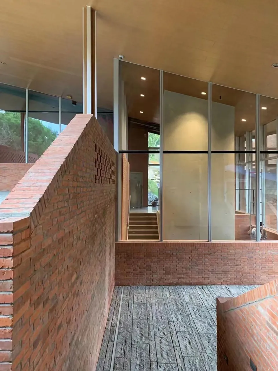 A modern office space featuring brick walls.
