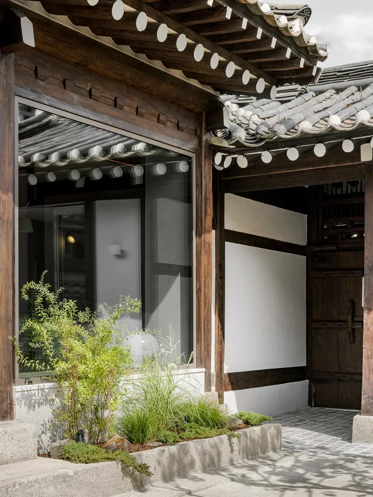 A modern storefront with wooden elements.
