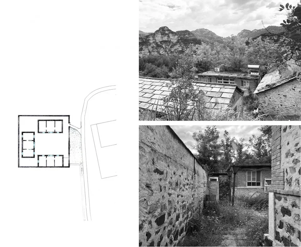 Residential house with stone facade and surrounding landscape
