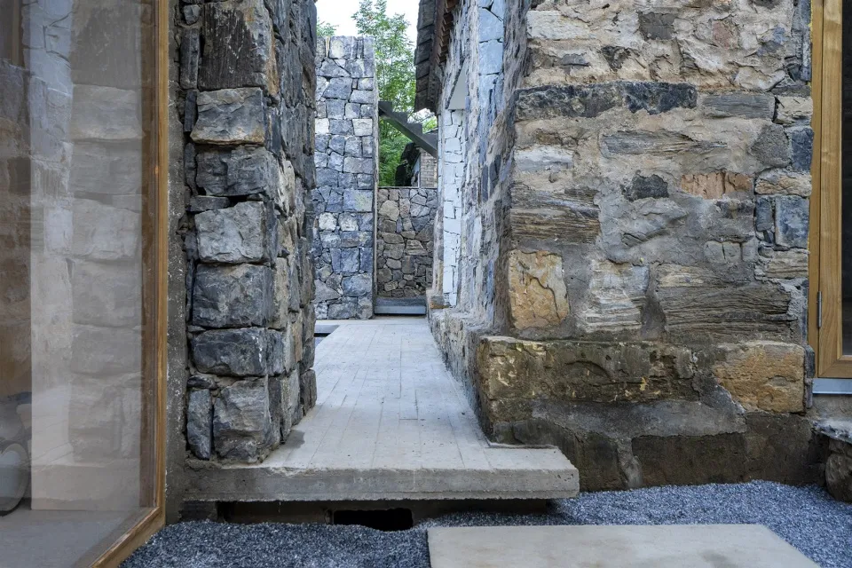 Stone, concrete, and gravel pathway interior