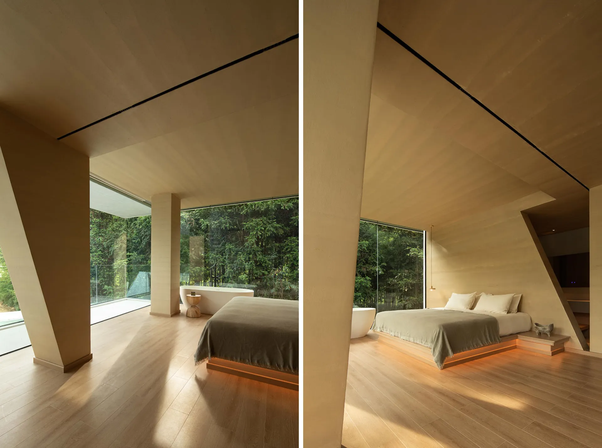 Modern bedroom featuring a wooden platform bed with a backdrop of a forest and large glass windows.