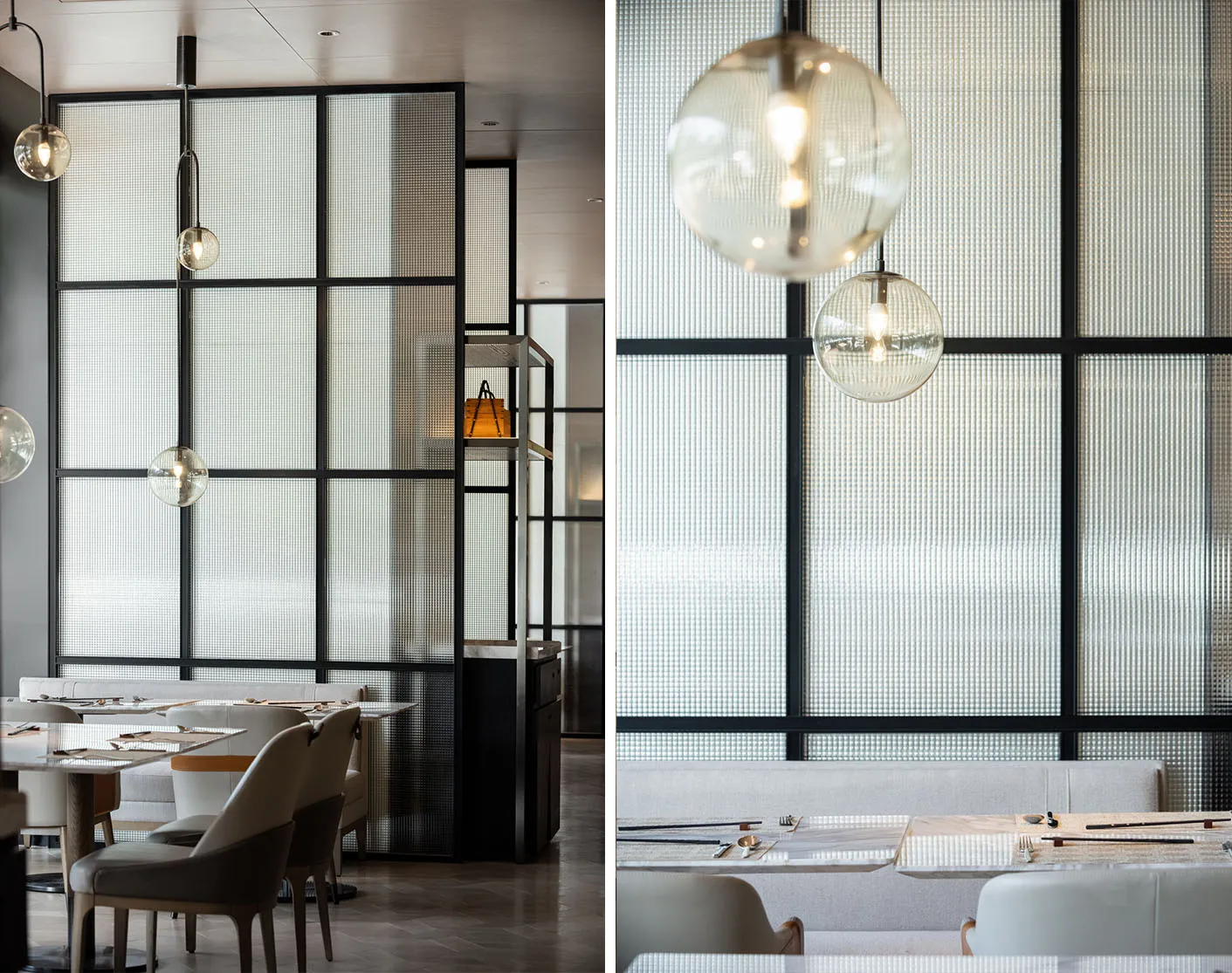 Modern restaurant with a glass wall and white seating.