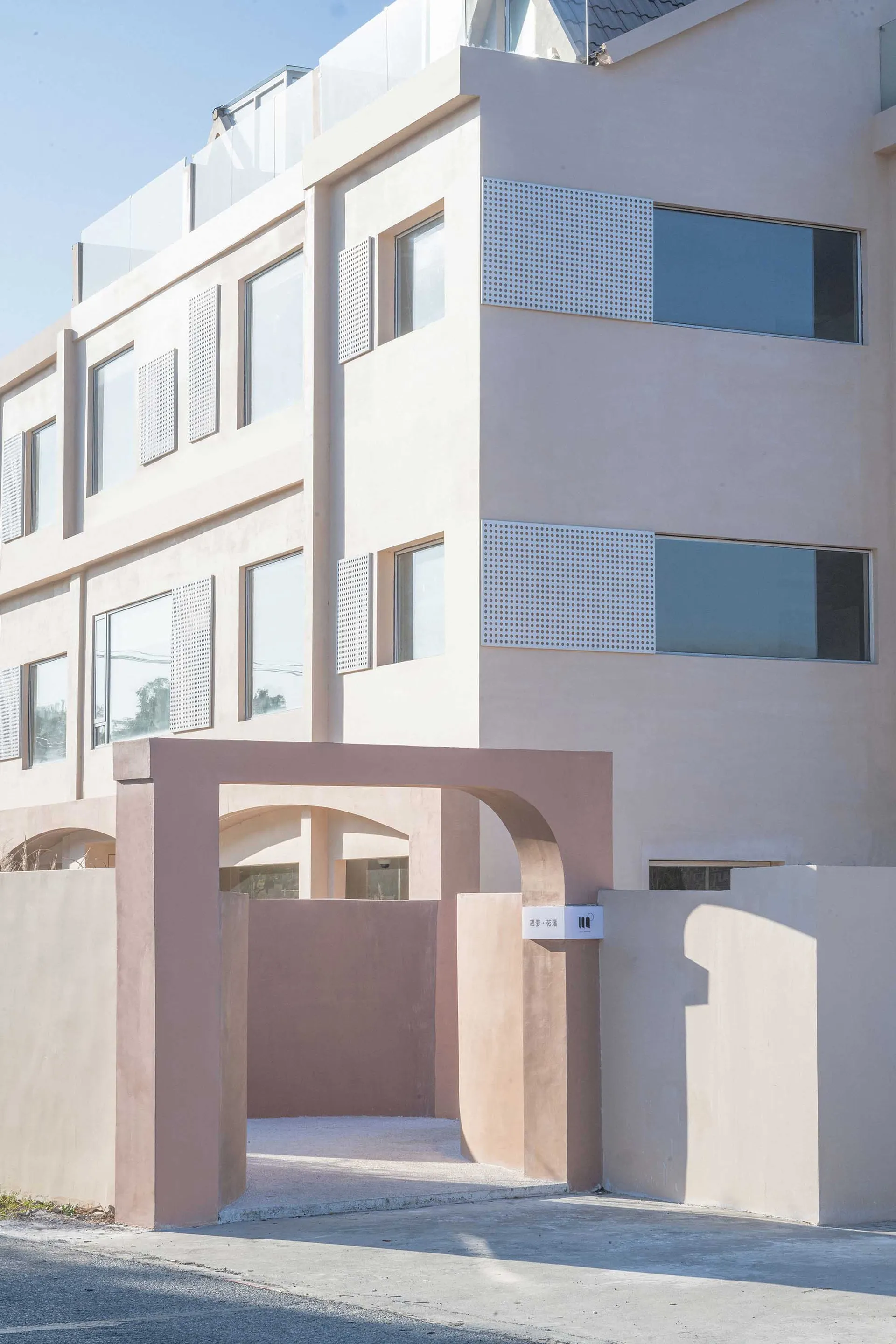 Modern minimalist building with concrete and glass elements