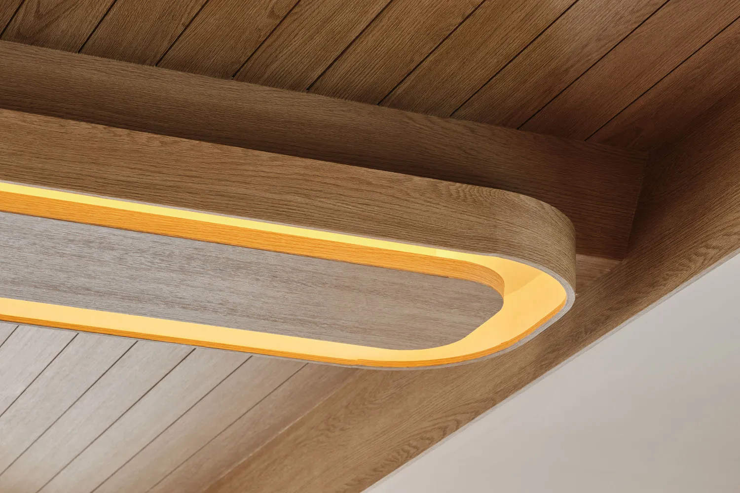 Warm-toned LED lighting fixture within a modern interior design setting
