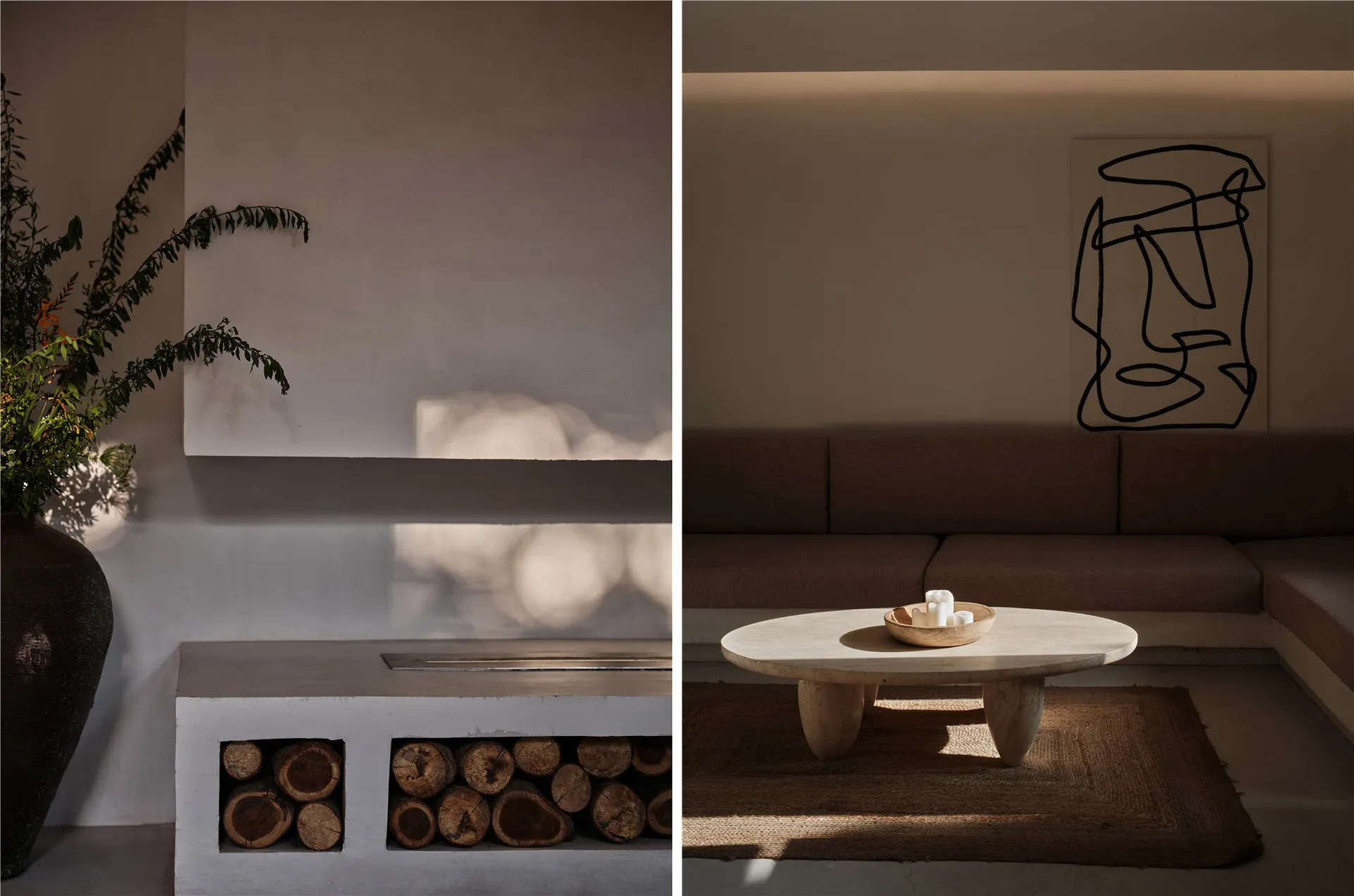 A minimalist concrete interior with a wooden coffee table and abstract wall art.